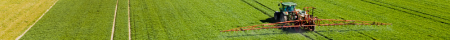 farm tractor works in the field